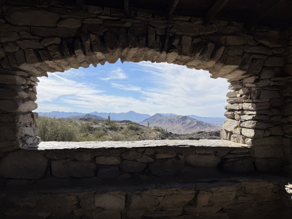 View looking out at mountains from inside Dobbins Lookout in Phoenix Arizona.